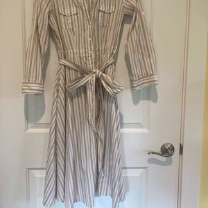 Striped dress slightly off white with navy blue and yellow stripes.